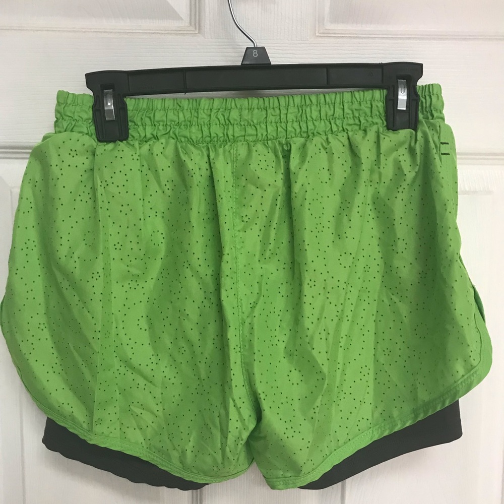Green running shorts